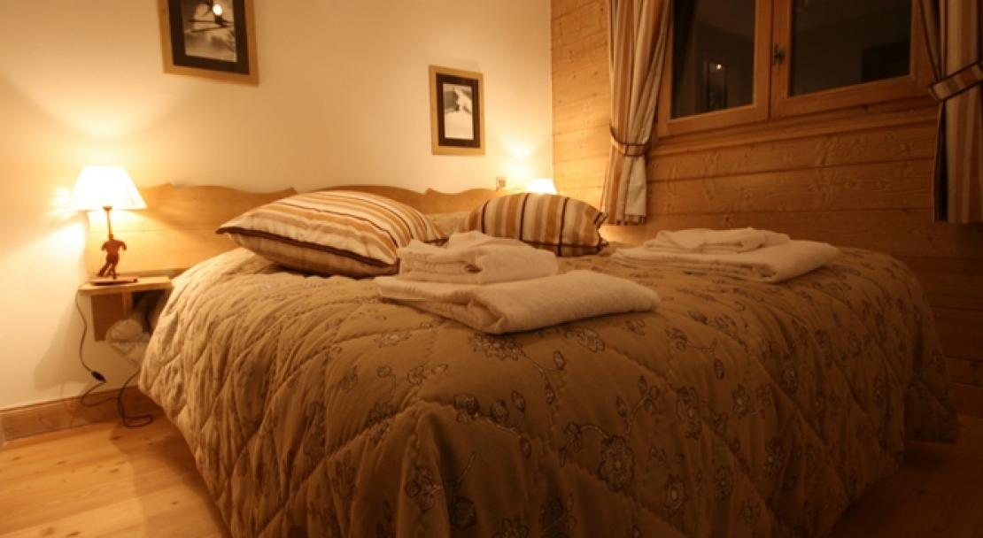 An example of a double bedroom in an apartment in Le Village de Lessy, Le Grand-Bornand/ Chinaillon, France